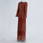Rust sequin maxi dress side on mannequin