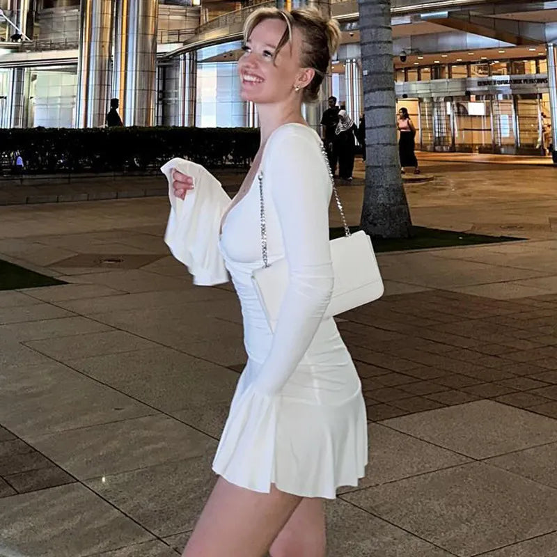 Akaila Low Cut Long Sleeve Ruffled Mini Dress