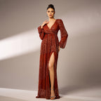 Rust sequin maxi dress walking pose with slit