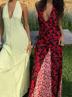 Two women wearing elegant dresses standing outdoors with a natural background.