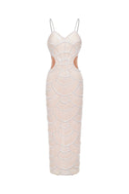 Elegant white evening gown with cut-out design on a white background