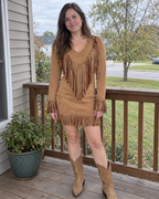 dakota fringe suede v-neck long sleeve mini dress in brown - outdoor full length view