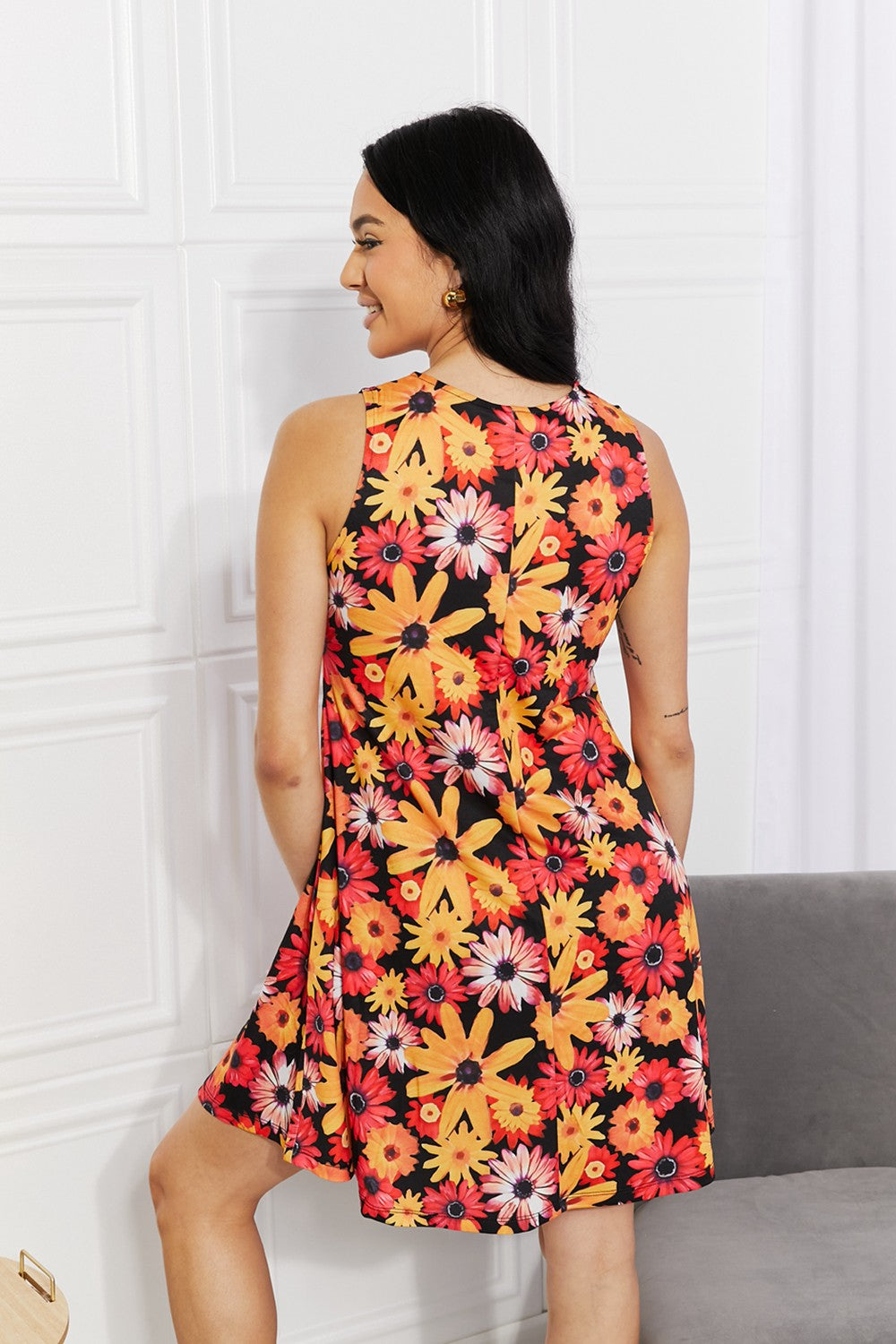 Yelete Full Size Floral Sleeveless Dress with Pockets Trendsi