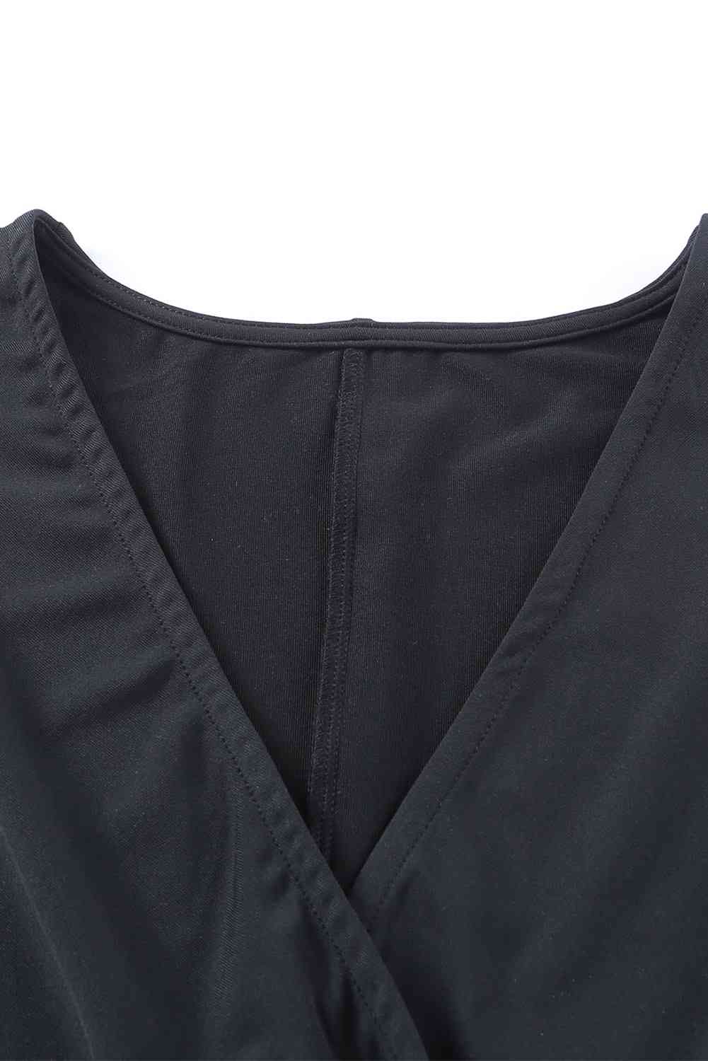 Twisted Plunge Three-Quarter Sleeve Jumpsuit Trendsi