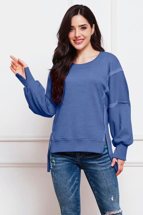 Exposed Seam High-Low Slit Sweatshirt Trendsi
