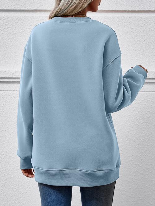 Graphic Round Neck Long Sleeve Sweatshirt Trendsi