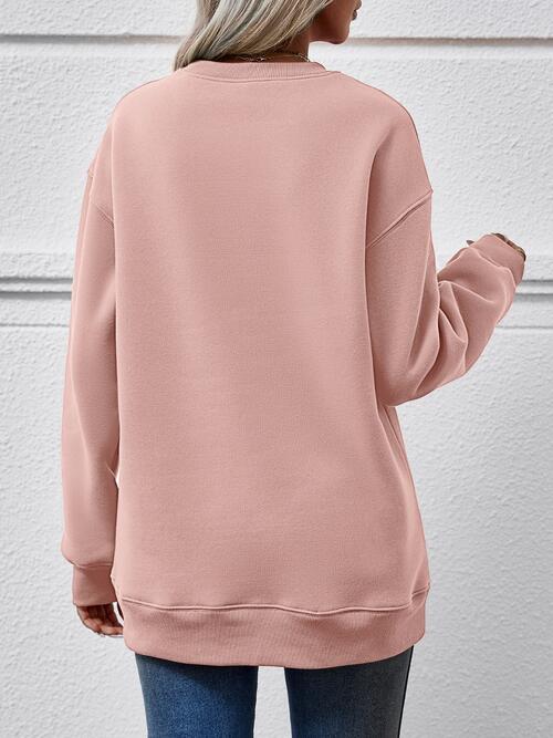 Graphic Round Neck Long Sleeve Sweatshirt Trendsi