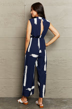 Printed Round Neck Cutout Jumpsuit with Pockets Trendsi