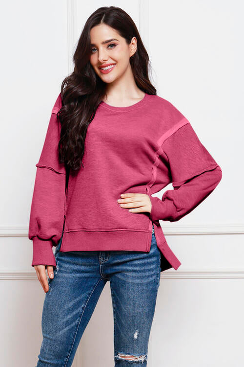 Exposed Seam High-Low Slit Sweatshirt Trendsi